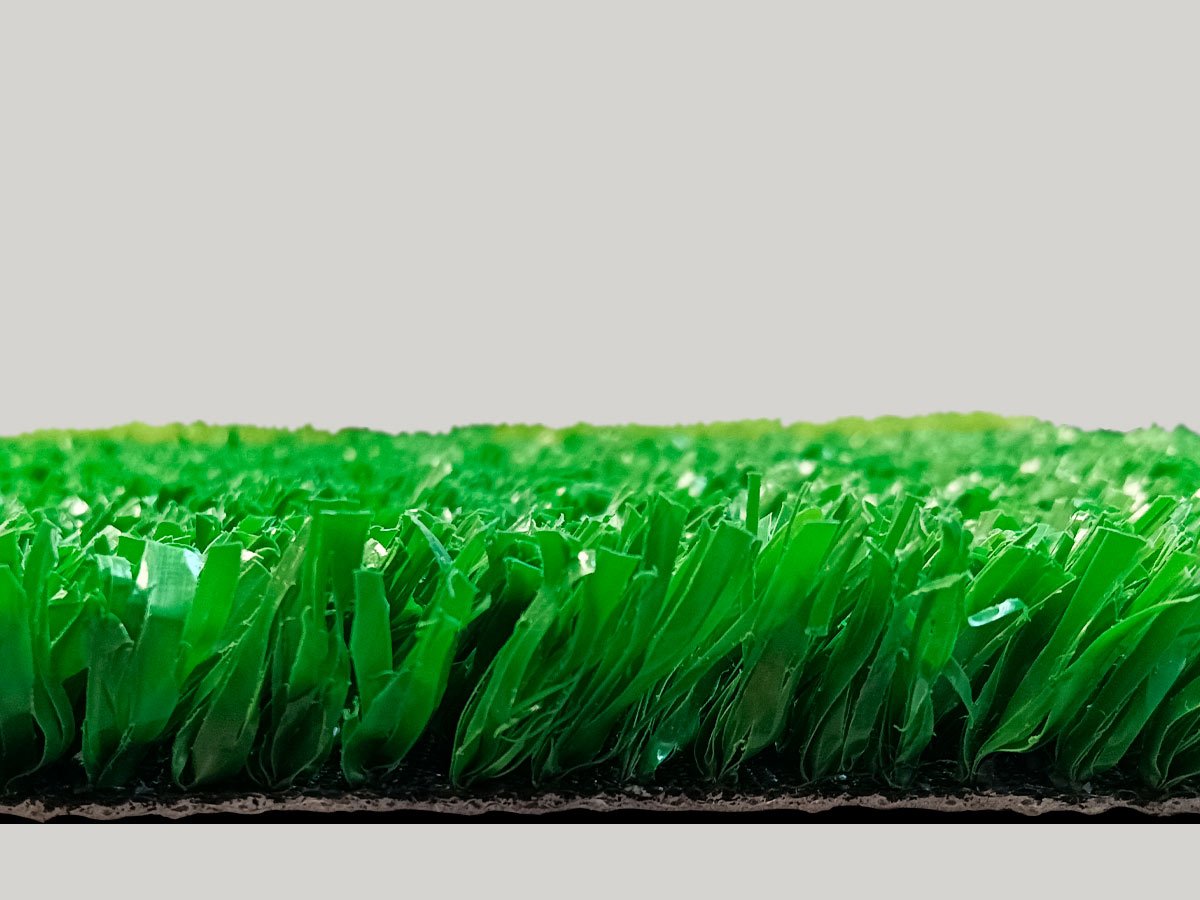 Pasto deportivo fibrilado verde